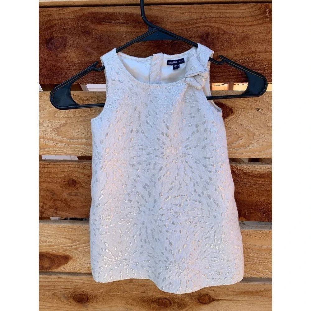 Baby‎ GAP white dress, lined with silver quilted flower pattern